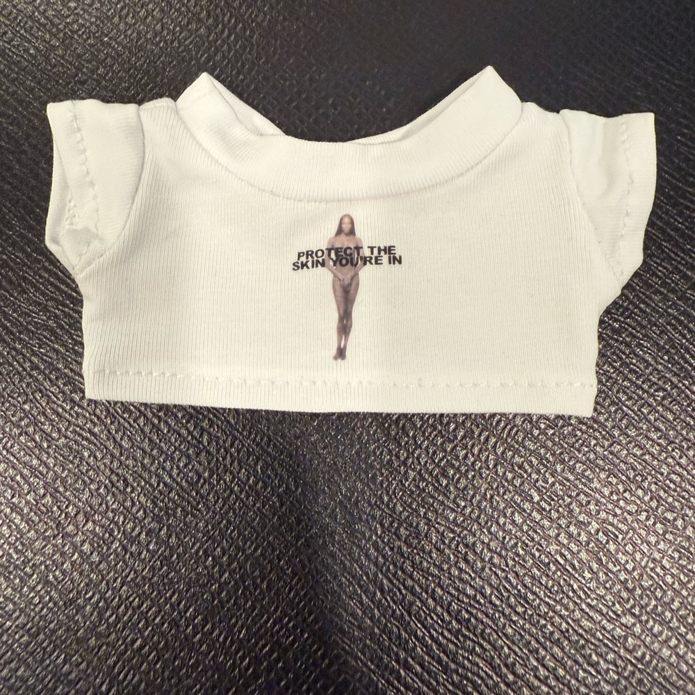 Labubu Marc Jacobs Protect the Skin You’re In T-shirt - Picture 2 of 4